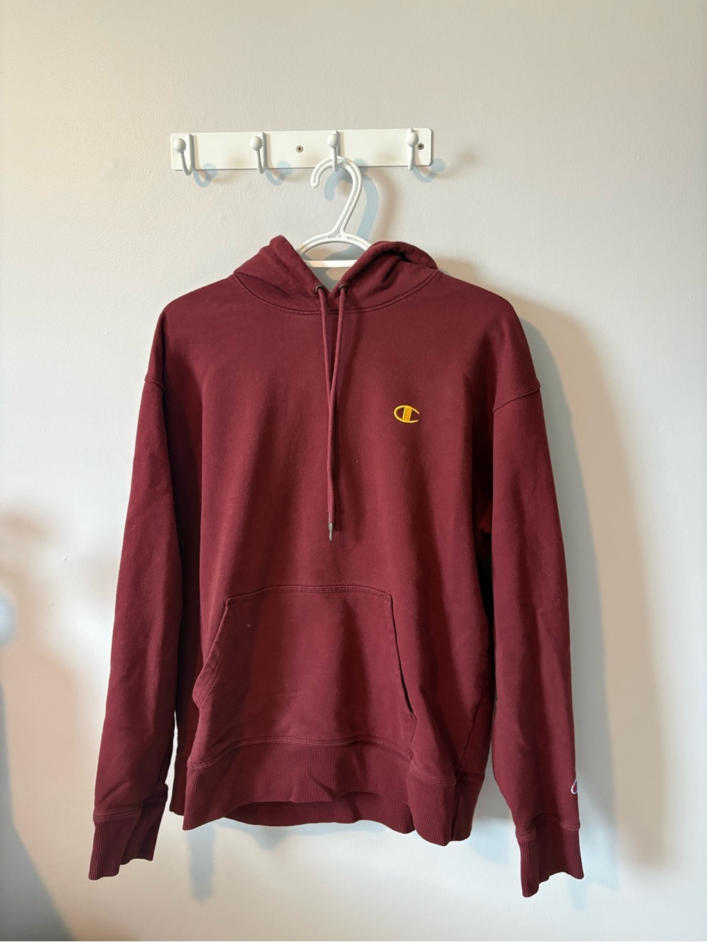 Champion Maroon Pullover Hoodie with Yellow Embroidered Logo